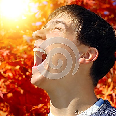 Teenager rejoices Autumn Stock Photo