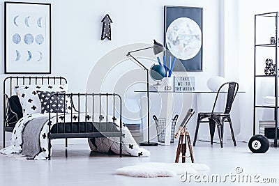Teenager`s bedroom interior with telescope Stock Photo