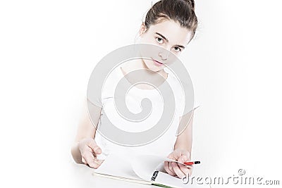 Teenager school girl browsing in a blank diary Stock Photo