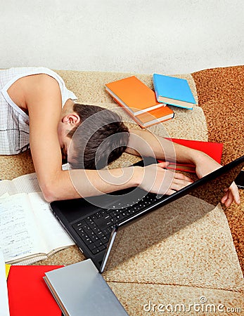 Teenager sleep with Laptop Stock Photo