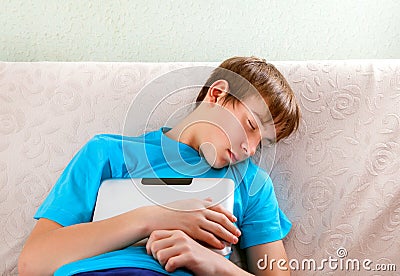 Teenager sleep with a Tablet Stock Photo