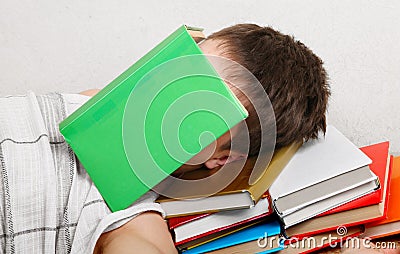 Teenager sleeps with the Books Stock Photo