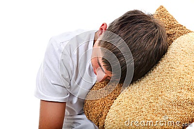 Teenager sleeps with Cushion Stock Photo
