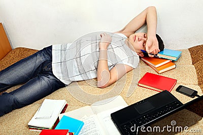 Teenager sleeps after Learning Stock Photo