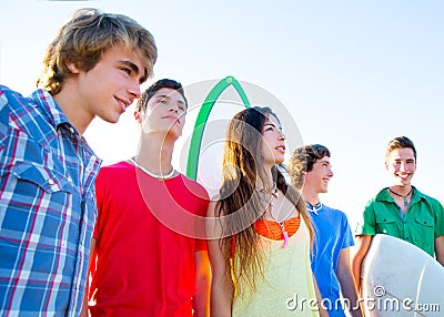 Teenager surfers boys and girls group happy Stock Photo
