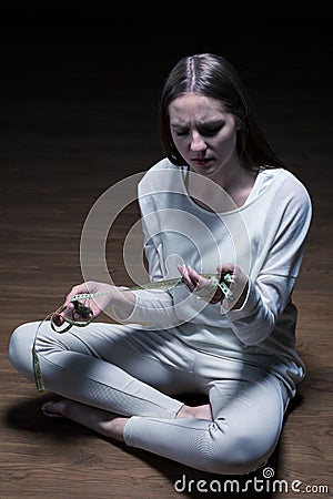 Teenager with weight obsession Stock Photo