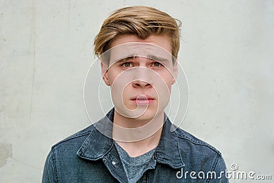 Teenager young man portrait model dissatisfied Stock Photo