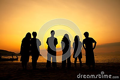 Teenagers on the beach Stock Photo