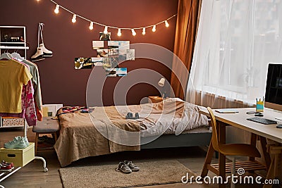 Teenagers room with lights pictures on wall Stock Photo