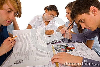 Teenagers studying together Stock Photo