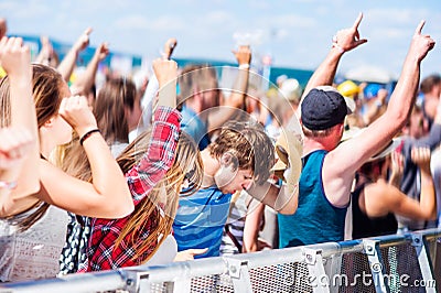 Teenagers at summer music festival having good time Stock Photo