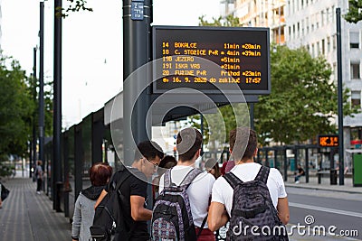 LJUBLJANA, SLOVENIA. 16.8.2020. Teenage boys waiting on the bus stop. Editorial Stock Photo