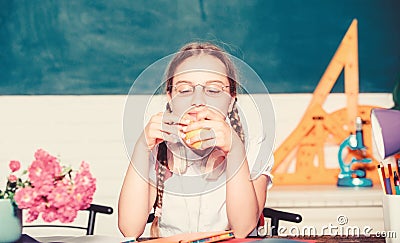 Teens eating healthy. healthy eating is good. small genius child in classroom. Lunch time. back to school. Einstein Stock Photo