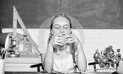 Teens eating healthy. healthy eating is good. small genius child in classroom. Lunch time. back to school. Einstein Stock Photo