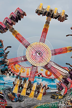 Teens Enjoy An Upside Down Carnival Ride Editorial Stock Photo