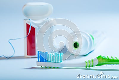 Teeth cleaning set on blue background Stock Photo