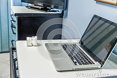 teeth plaster cast near laptop Stock Photo