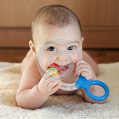 Teething baby Stock Photo