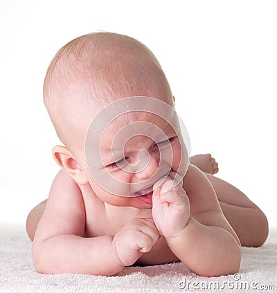 Teething baby Stock Photo