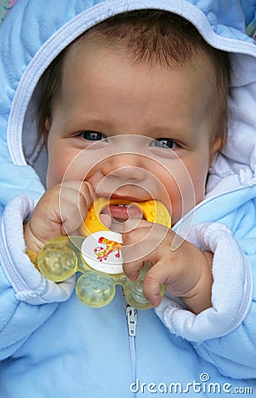 Teething baby Stock Photo