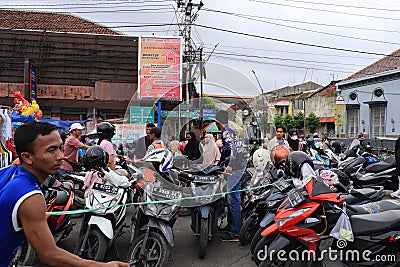 Tegal, January 2023. Photo portrait of vehicles parking at the old town hall alun alun tegal visiting vendors selling various Editorial Stock Photo