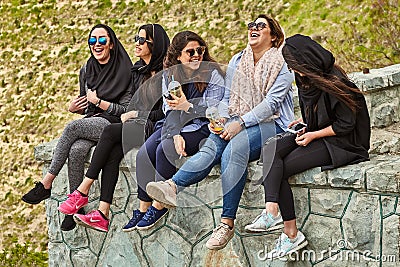 Iranian women chat and laugh,Tehran, Iran. Editorial Stock Photo