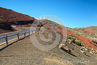Teide observatory, empty road, desert blue skies, red rocks Stock Photo