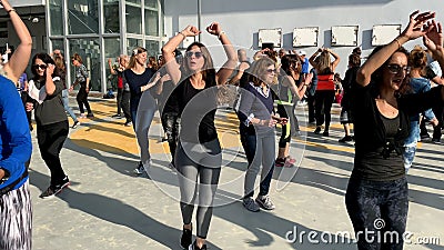 Unidentified citizens dancing traditional Israeli dances on Tel Aviv Promenade Editorial Stock Photo