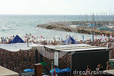 Tel Aviv, Israel - June 7, 2013: Beach Party on Gordon beach in Tel Aviv, Israel. Editorial Stock Photo