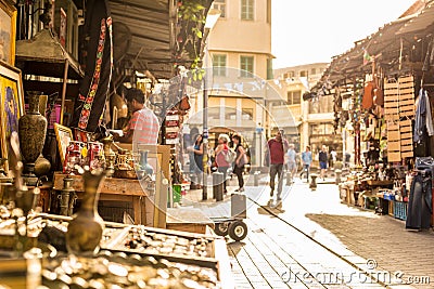 Tel Aviv, Israel - Oct 26th 2018 - Locals and tourists enjoying a local market in a late afternoon light in Tel Aviv, Israel Editorial Stock Photo