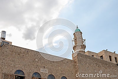 Al-Bahr Mosque in the old town of Yafo and the skyscrapers of Tel Aviv in the distance, in Tel Aviv - Yafo city, Israel Editorial Stock Photo