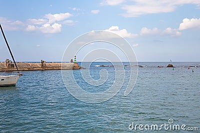 Promenade in the old town of Yafo and the skyscrapers of Tel Aviv in the distance, in Tel Aviv - Yafo city, Israel Editorial Stock Photo