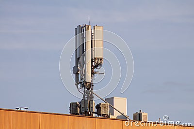 Telecommunication antenna for mobile communication. On a building in a city Stock Photo