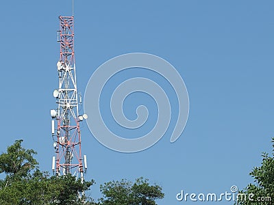 Telecommunication tower with blue skyline Stock Photo