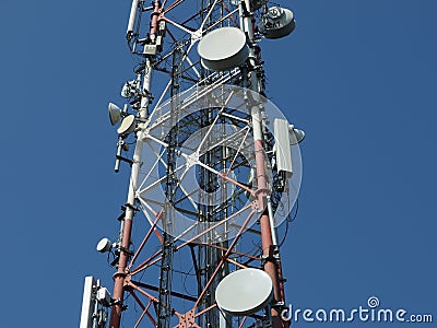 Telecommunication tower with blue skyline Stock Photo