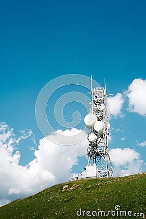 Telecommunication tower with many antennas and repeaters Stock Photo