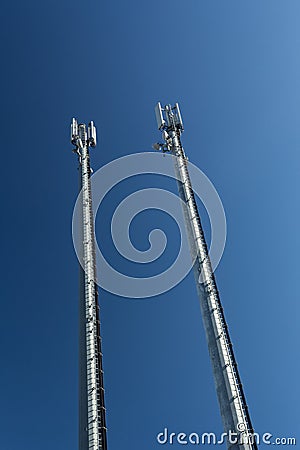 Telecommunications towers with blue sky Stock Photo