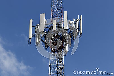 Telecommunications and Wireless Cell Equipment Tower with Directional Mobile Phone Antenna V Stock Photo