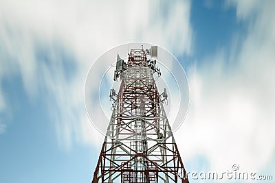 Telecoms building tower under movement cloud with long exposure Stock Photo