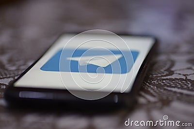 Telegram logo on mobile Editorial Stock Photo