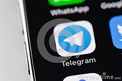 Telegram, mobile icon app on the screen smartphone iPhone macro interface. Telegram - cross-platform messenger. Batumi, Georgia - Editorial Stock Photo
