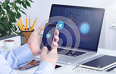 Telegram Open Network TON white paper on the smartphone and laptop screens Editorial Stock Photo