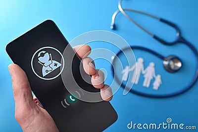Telephone healthcare with hand with phone receiving call from doctor Stock Photo