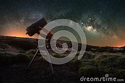 Telescope watching the Milky Way in the spring visible from Teide National Park near Observatory. Jupiter is sparkling surrounded Stock Photo