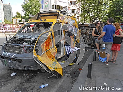 Television channel broadcast vehicle damaged in Taksim Square. Editorial Stock Photo