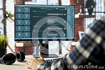 Teleworking man usingLLM powered chatbot Stock Photo