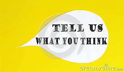 Tell Us What You Think speech bubble isolated on the yellow background Stock Photo