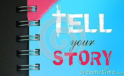 Tell your story words on sky blue page of copyybook in white and pink. Storytelling copywriting concept Stock Photo