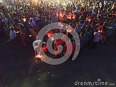 Thousand of devotees gather to release lamp to sea Editorial Stock Photo