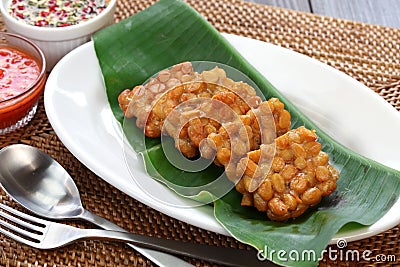 Tempe goreng, fried tempeh, indonesian vegetarian food Stock Photo